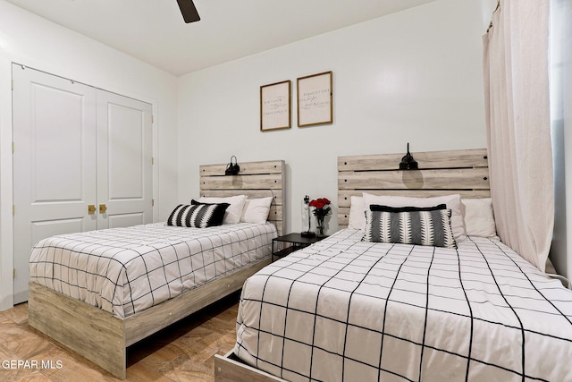 bedroom with a closet and a ceiling fan