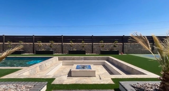 view of pool featuring a fenced in pool, an outdoor fire pit, a patio, and fence