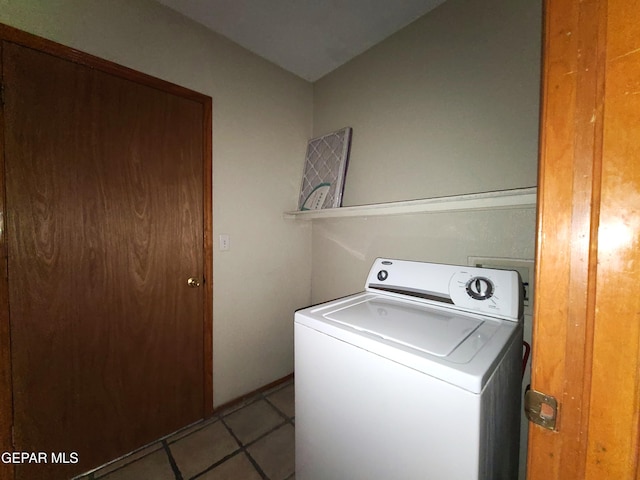 laundry area with washer / dryer, tile patterned floors, and laundry area