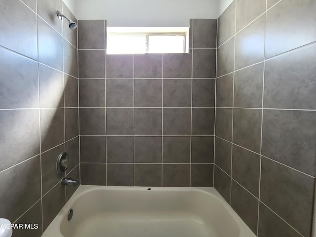 bathroom featuring shower / bath combination