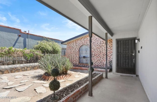 view of patio with fence