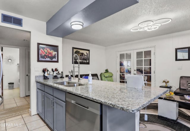 kitchen featuring a sink, visible vents, french doors, light stone countertops, and dishwasher