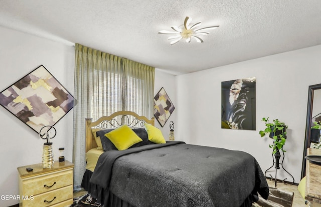 bedroom with a textured ceiling