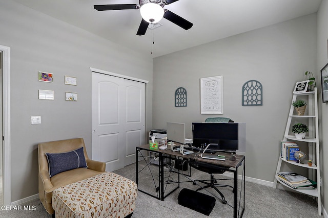 office with a ceiling fan, carpet, and baseboards