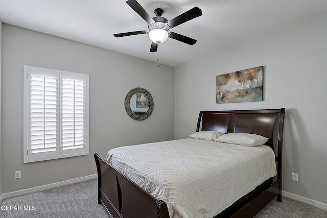 bedroom featuring a ceiling fan, baseboards, and carpet floors