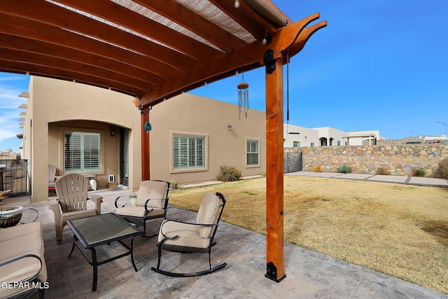 view of patio / terrace featuring fence