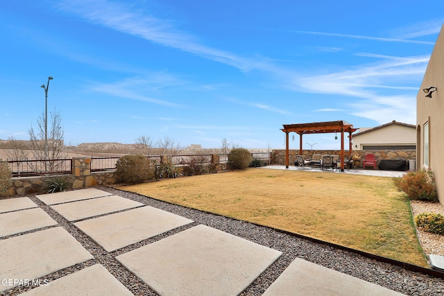 view of yard featuring a fenced backyard, a pergola, and a patio