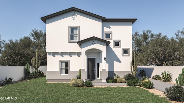 view of front of property featuring a front yard, fence, and stucco siding