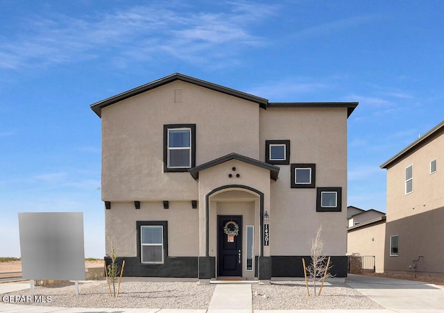 view of front of property featuring stucco siding
