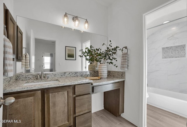bathroom featuring vanity and wood tiled floors