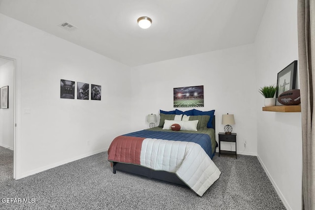 carpeted bedroom with baseboards