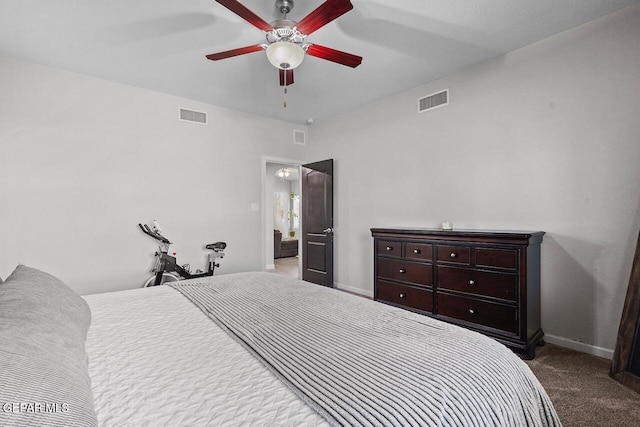 bedroom featuring visible vents, carpet floors, baseboards, and ceiling fan