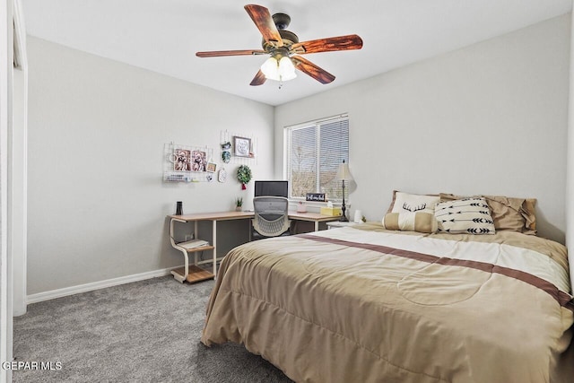 carpeted bedroom featuring baseboards and ceiling fan