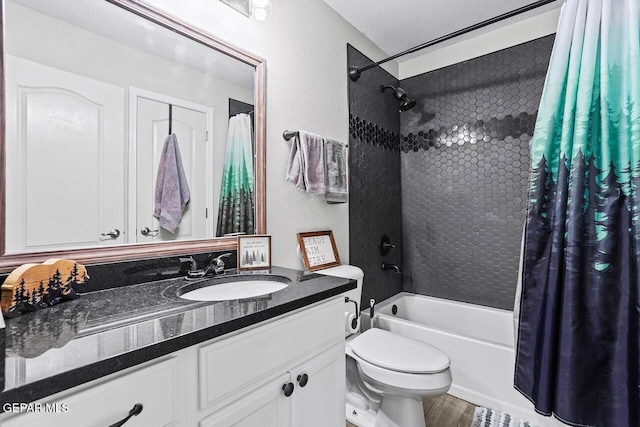 bathroom featuring toilet, vanity, and shower / bathtub combination with curtain