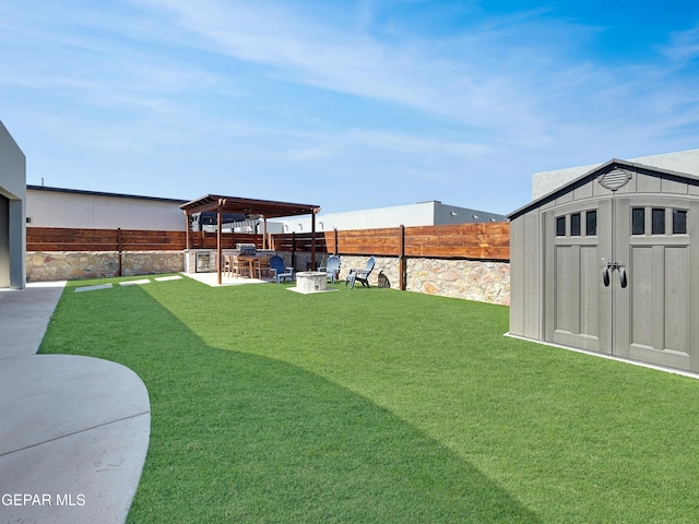 view of yard with a fenced backyard, an outdoor structure, a fire pit, a storage shed, and a patio area