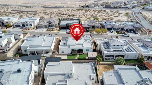 birds eye view of property with a residential view