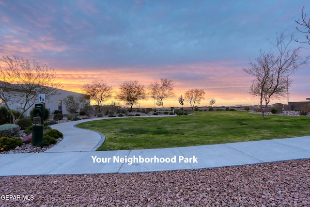 view of home's community featuring a yard