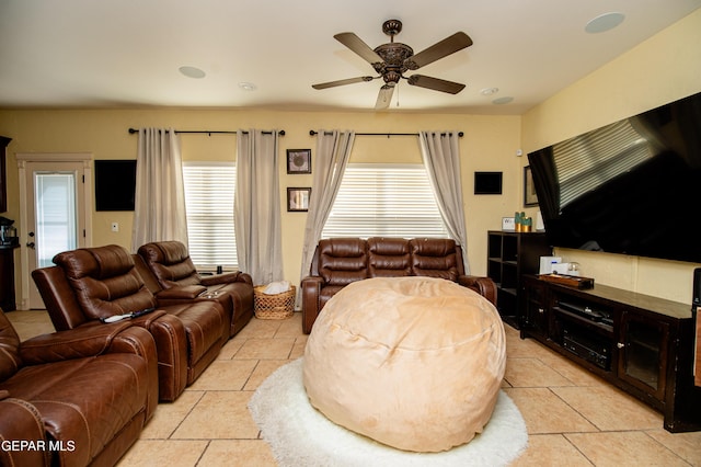 living area with ceiling fan