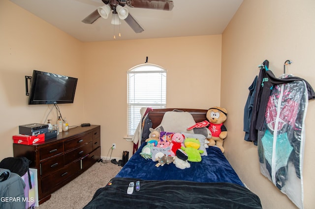 bedroom featuring carpet and a ceiling fan