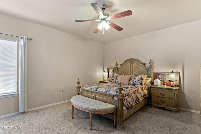 bedroom featuring carpet flooring, baseboards, and ceiling fan