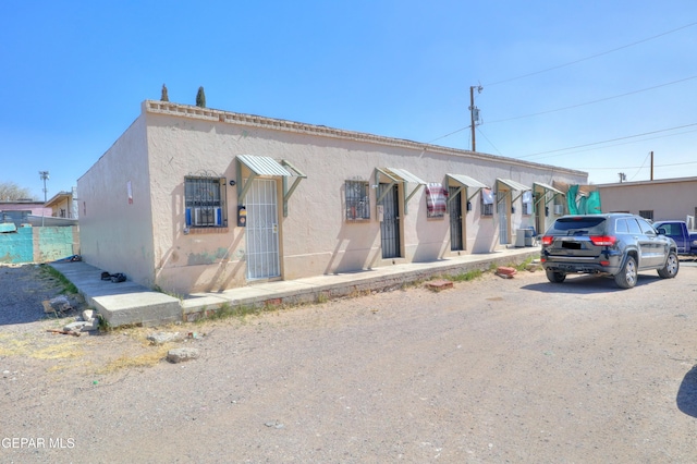 view of front of home featuring stucco siding