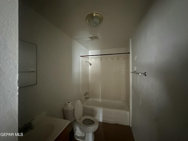 full bathroom with visible vents, toilet, vanity, and bathing tub / shower combination