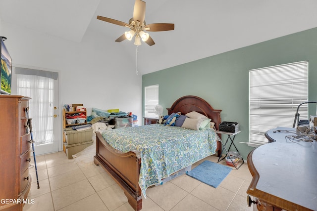 bedroom with light tile patterned floors, a ceiling fan, and high vaulted ceiling