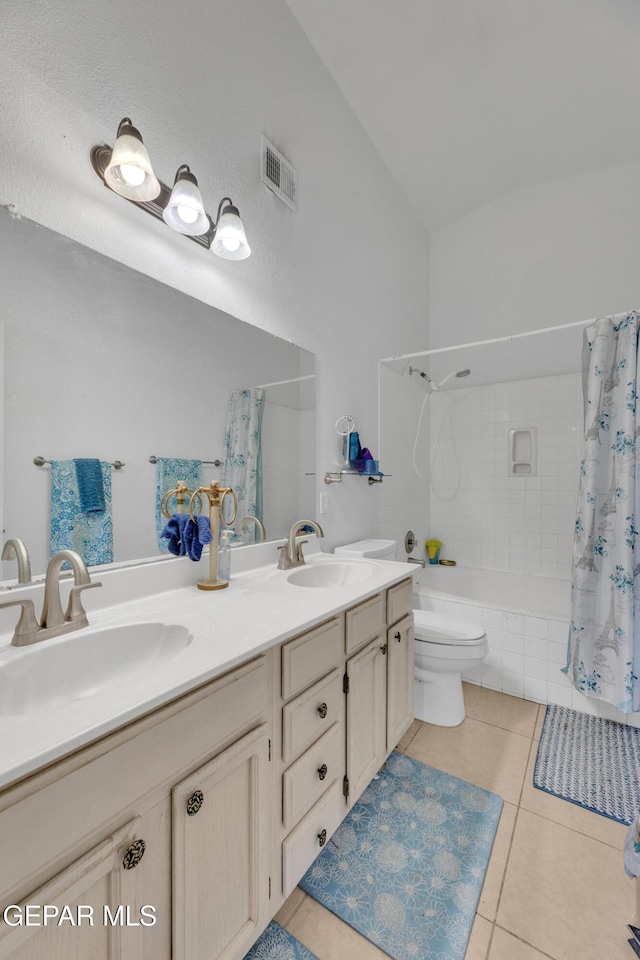 full bathroom with tile patterned floors, visible vents, toilet, and a sink