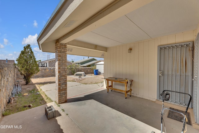 view of patio / terrace with fence