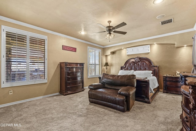 bedroom featuring visible vents, carpet, and ornamental molding