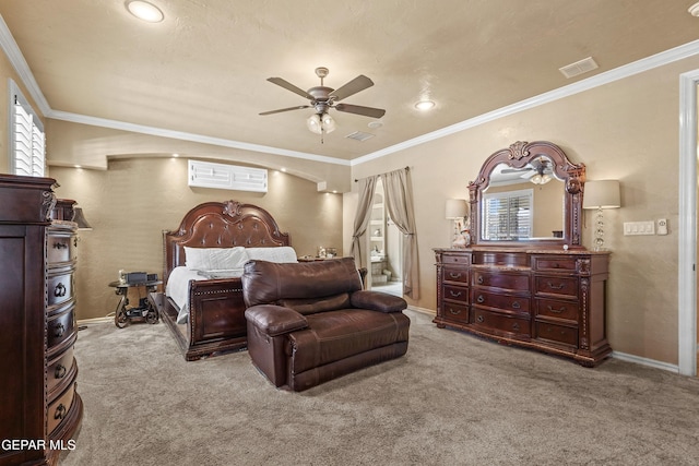 bedroom with visible vents, a wall mounted air conditioner, crown molding, and carpet