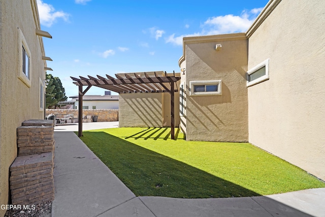 view of yard featuring a pergola and a patio