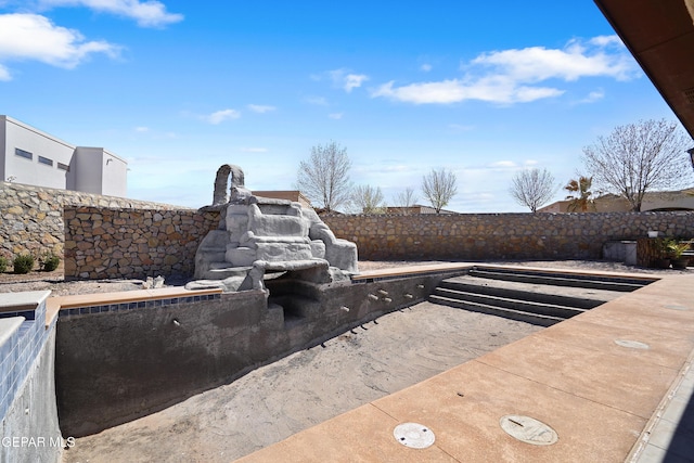 view of patio / terrace with fence