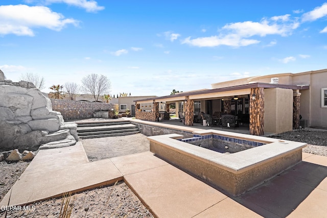 view of patio / terrace featuring central air condition unit and ceiling fan