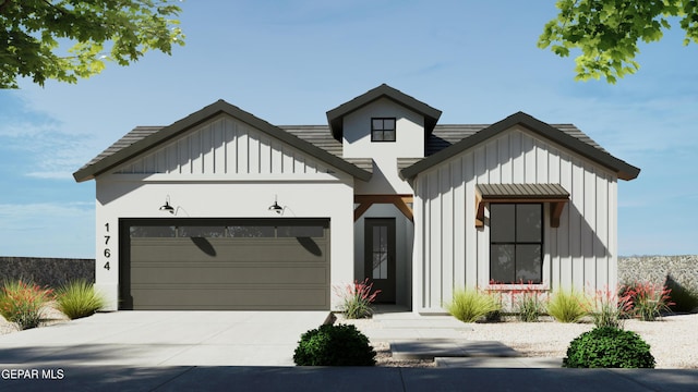 modern inspired farmhouse featuring concrete driveway, a garage, and board and batten siding