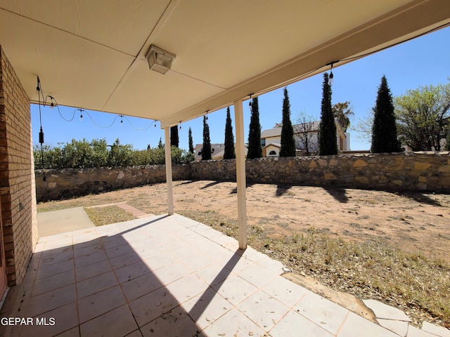 view of patio featuring a fenced backyard