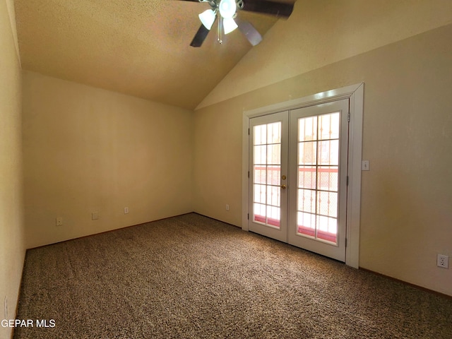 unfurnished room with french doors, a ceiling fan, lofted ceiling, and carpet floors