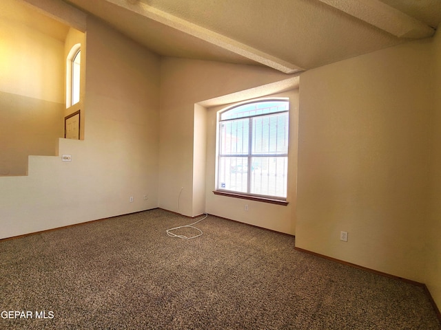 unfurnished room with baseboards, carpet floors, and lofted ceiling