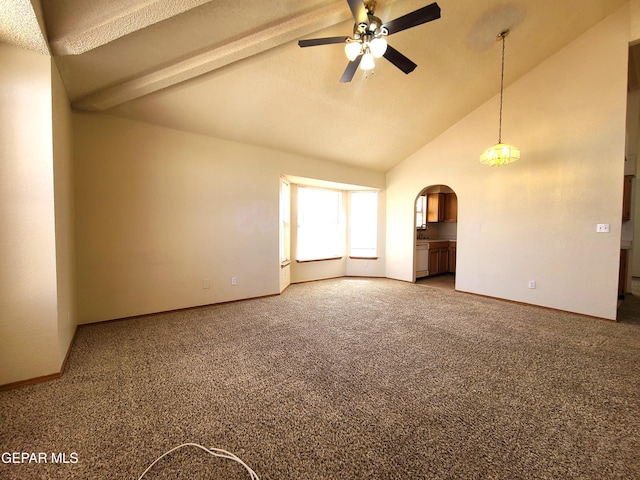 unfurnished living room featuring arched walkways, baseboards, a ceiling fan, and carpet