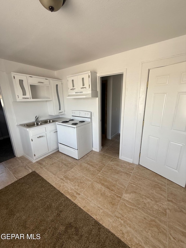 kitchen with under cabinet range hood, open shelves, a sink, white electric range oven, and white cabinetry