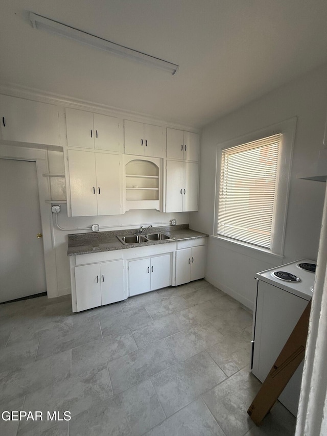 kitchen with a sink, open shelves, white electric range oven, and white cabinetry