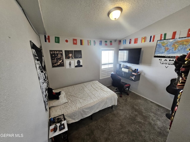 bedroom featuring baseboards, a textured ceiling, lofted ceiling, and carpet floors