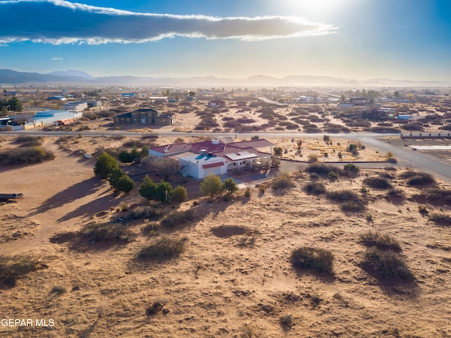 14097 Silver Spur St, El Paso, TX 79938 - aerial view of sparsely populated area featuring a desert landscape and a mountainous background
