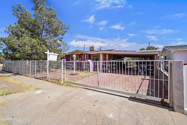 view of front of house featuring fence