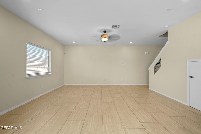 spare room featuring a ceiling fan, recessed lighting, baseboards, and visible vents