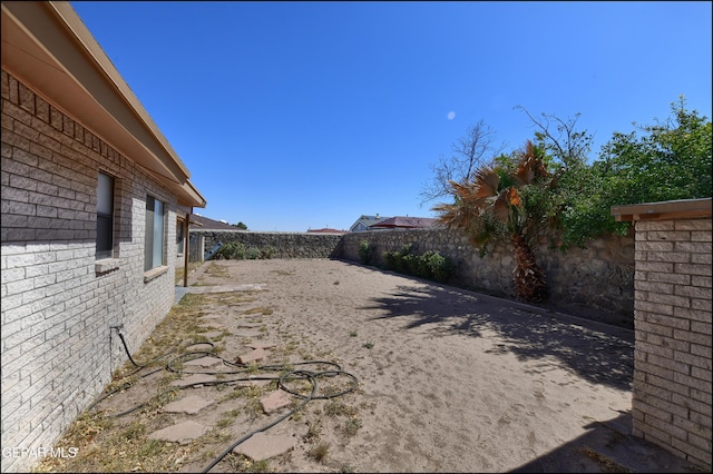 view of yard featuring a fenced backyard