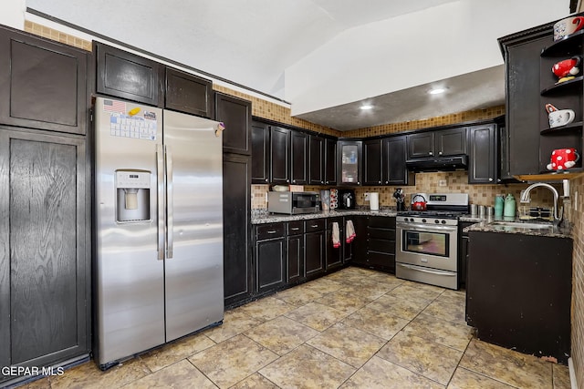 kitchen with open shelves, lofted ceiling, a sink, stainless steel appliances, and under cabinet range hood