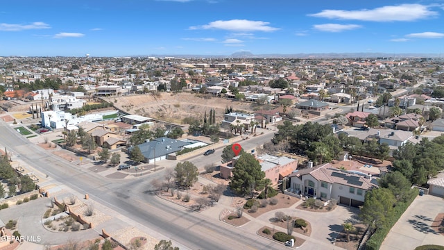 birds eye view of property with a residential view