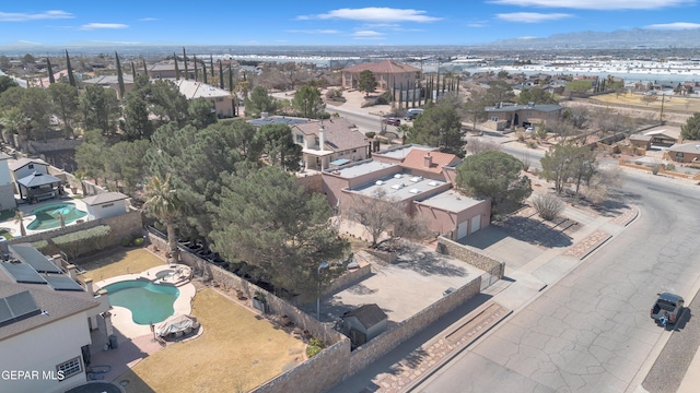 birds eye view of property with a residential view