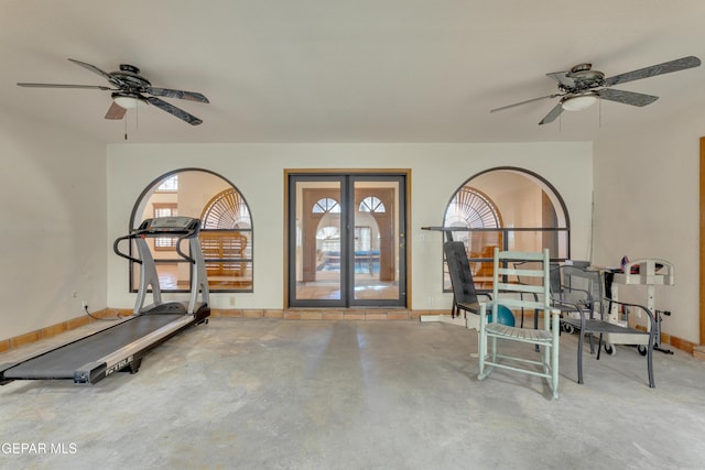 workout room featuring french doors, baseboards, and ceiling fan